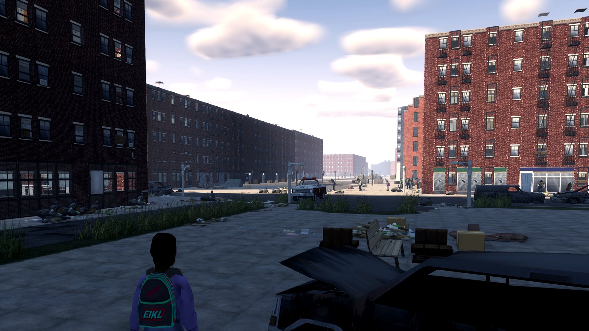 Third person in a brick plaza with a wrecked car, zombies far down the avenue